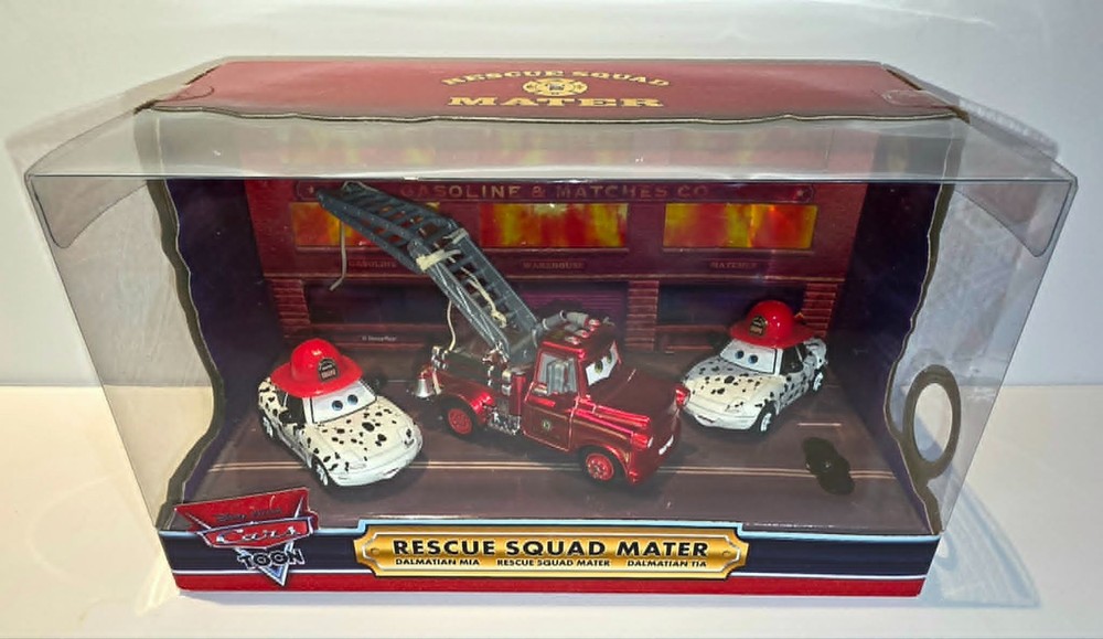 SDCC Disney Cars Rescue Squad Mater (Metallic) with Dalmatian Mia and Tia – NEW
