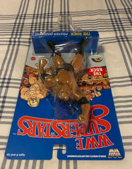 2026 WWE SUPERSTARS THE ROCK-BLUE BACKING-NEW IN ORIGINAL SEALED PACKAGE