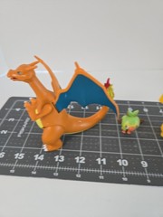 Lot of 4 Pokémon Figures Charizard Grookey Pikachu w/ Rotom Pokédex Togepi…