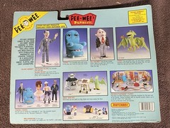 NEW SEALED IN PACKAGE PEE-WEE HERMAN WITH HIS FAMOUS SCOOTER AND FAVORITE HELMET