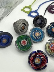 Beyblade Lot Spinners, Rip Cords, Launchers, Tornadoes, And Some parts