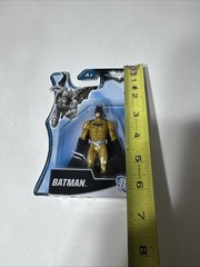 Mattel/DC Comics – The Dark Knight Rises Batman Action Figure in gold – Y1455