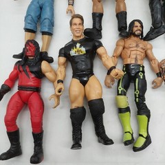 WWE Action Figures lot of 12 Figures Various Years Brands Sizes Read