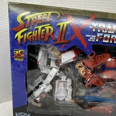 Takara Tomy Hasbro Transformers Street Fighter Optimus Prime vs Megatron Boxed …