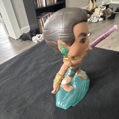 Plastic Figurine Brown Green Gold Purple Aqua With Staff Standing on Water