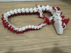 3D Printed, 3D Articulated Dragon 24in Glow In The Dark Red / White Dual Color