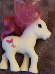 Girls White Pony With Butterflies And Blue Eyes And Pink Hair 4″