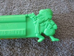 1975 Plastic Green/Yellow Toy Harmonica Have No Fear Underdog Is Here Lednardo