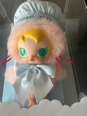 item is the Pop Mart Baby Molly 20th Anniversary Vinyl Plush Blister Pack.