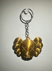 KAWS “Chum” Figure Keychain – Gold