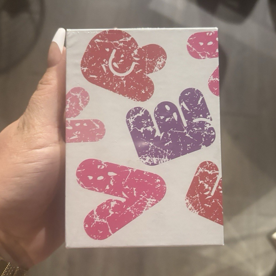 Multicolor Action Figure Box with Heart-Shaped Designs and Colorful Hand Designs
