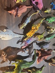 Lot Of 20 Random Mixed Size Plastic Or Resin Dinosaur Toys