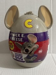 CHUCK E. CHEESE Mystery Surprise Egg Collectible ~ 10 Items Inside w/ E Ticket