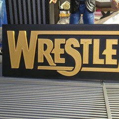 WWE Mattel Large 12 X 3 Gold WrestleMania Logo Accessory