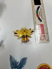 Pokemon Figure Lot Ash Ketchum Pikachu Hoothoot Articuno Zapdos Bellossom Onix