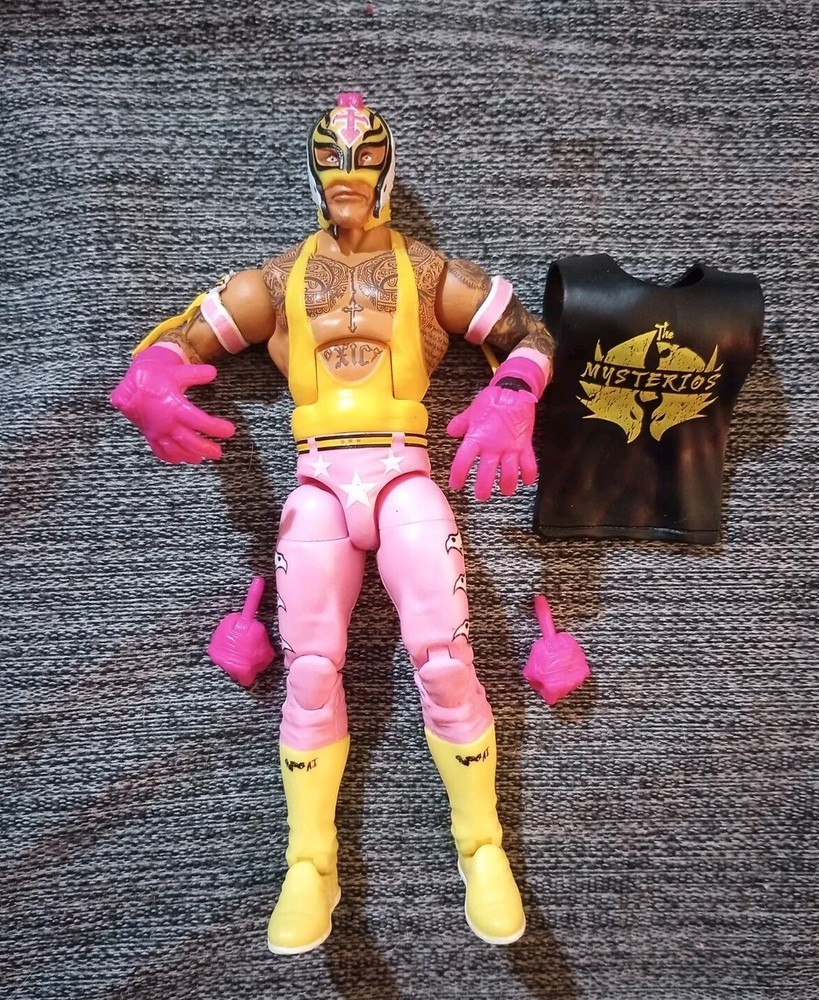 Mattel WWE Elite Top Picks 2023 Rey Mysterio Jr. Figure Lucha Libre Yellow Pink