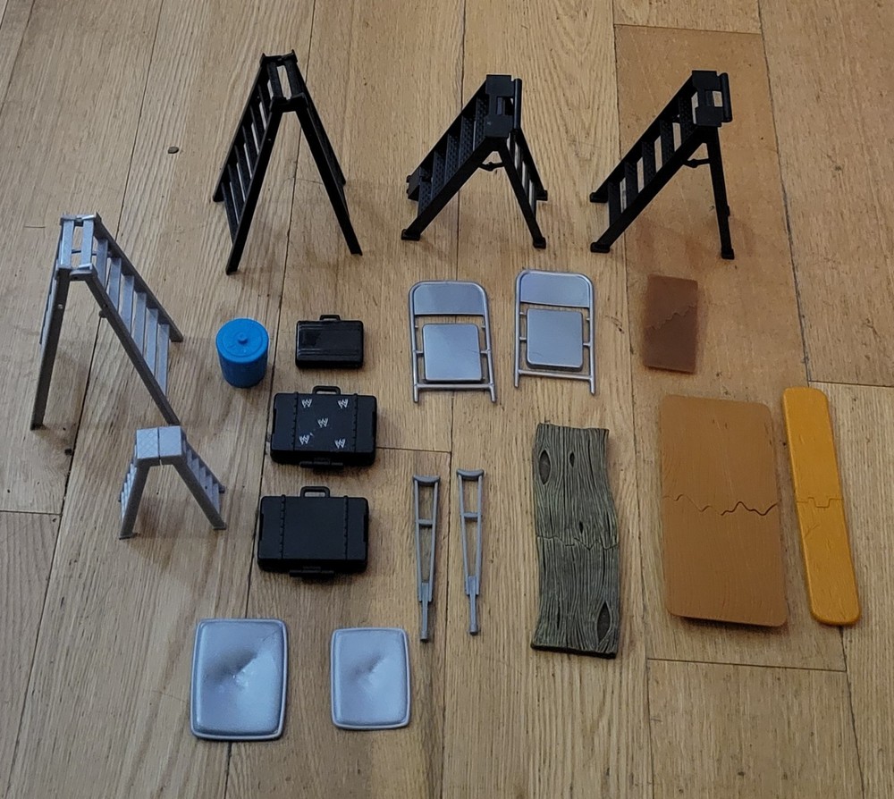 WWE LOT EXTRAS BUNDLE ACCESSORIES Ladders, Chairs, Crutches, Tables, Briefcases