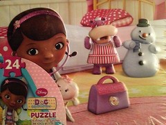 Disney “Frozen” & “Doc McStuffens” 48 Pc Puzzles in Lunch Boxes, Both Brand New!