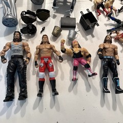 Wrestling figures random accessories lot multiple companies WWF WCW etc.