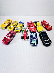 Disney Pixar Movie Cars 2 World Grand Prix 10 Car Launcher Case + 10 Racers Crew