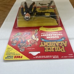 Kenner Police Academy Eugene Tackleberry Boxed Figure w/ Flak Vest & Weapons