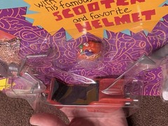 NEW SEALED IN PACKAGE PEE-WEE HERMAN WITH HIS FAMOUS SCOOTER AND FAVORITE HELMET