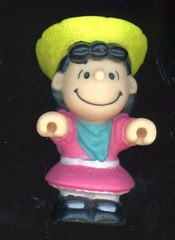 Lucy 3″ Tall Hard Rubber? ABS Plastic? Figurine pushing a wheelbarrow B2-B7
