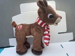 Rudolph the Red Nosed Reindeer 50 Years And Still Glow Sings & Lights Up Plush
