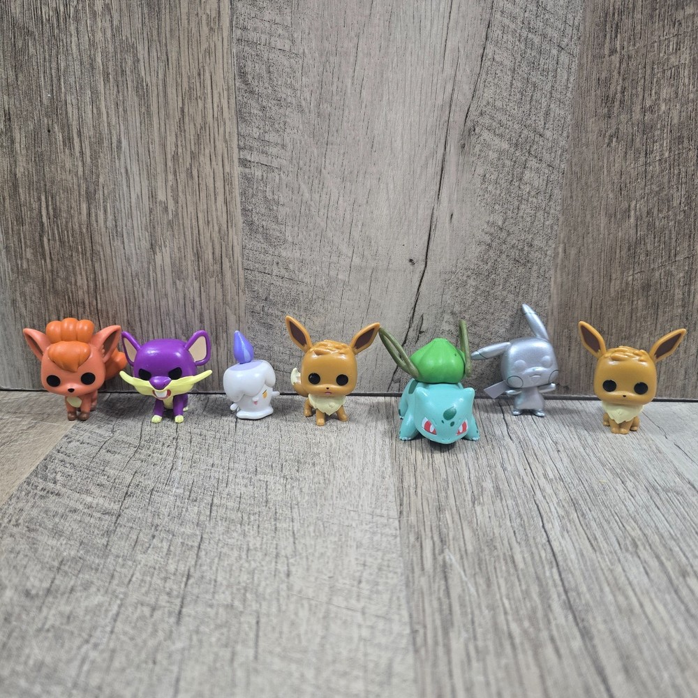Lot of 7 Pokemon Funko Pop Mini Figures – See photos for characters