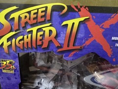 2022 Street Fighter II x Transformers – Optimus Prime (RYU) vs Megatron (BISON)