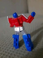 2 1/2″ Plastic Red Silver+Blue Optimus Prime Mini Transformer Action Figure Toy