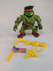 Playmates “Raph, the Green Teen Beret” action figure from the 1991 Near Complete