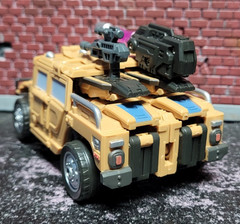 Warbotron WB01-C Sly Strike figure – complete with box and sleeve