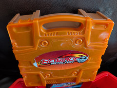Mixed Beyblade Lot: Metal Fusion, Burst, 2 Stadium Arenas, Case, Launchers As Is