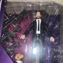 DIAMOND SELECT JOHN WICK DELUXE ACTION FIGURE WITH DOG, COIN & GUNS