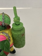 Vintage TMNT Sewer Spitting Cycling Raph Teenage Mutant Ninja Turtles Figure