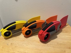 Tron Lightcycles With Light Trails. 3D Printed. Yellow. Orange. Red.