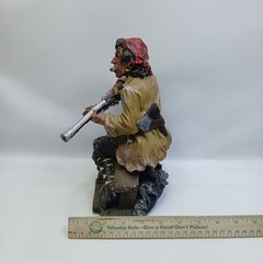 Resin Pirate 10″ Statue with Knife, Musket & Pistol on a bench with treasures