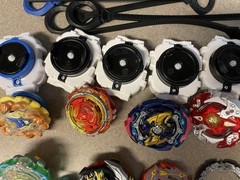 Beyblades, assorted, everything pictured is included