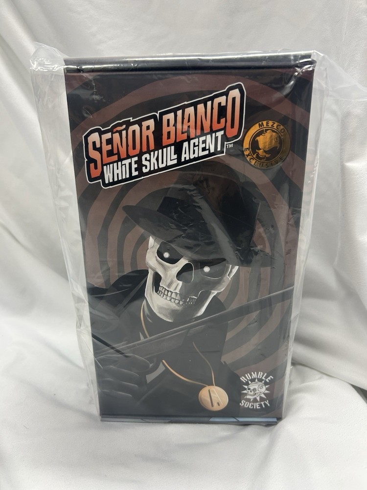 Sealed Mezco ONE:12 COLLECTIVE White Skull Agent: Senor Blanco Figure In hand