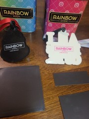 Rainbow High Surprise collectible Tins: VIOLET, SUNNY, SKYLER, SUNNY. USED. READ
