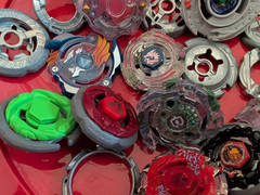 Mixed Beyblade Lot: Metal Fusion, Burst, 2 Stadium Arenas, Case, Launchers As Is