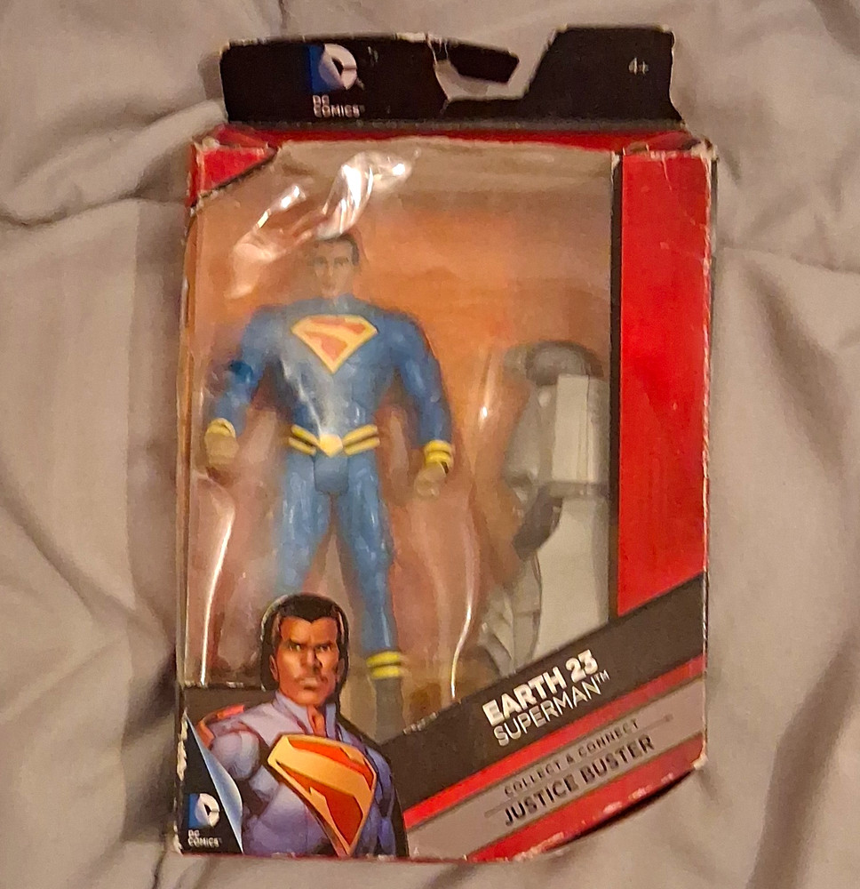 DC Comics Superman Earth 23 Action Figure w/ Justice Buster – Plastic