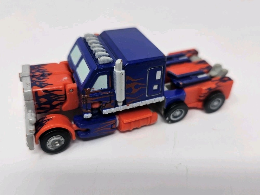 Transformers Octomus Prime, Orange and Black Truck 4in x 2in x 1.5in