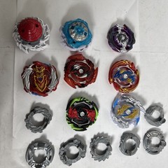 Bay Blades Lot Of 8 Bayblades Plus Parts and launchers