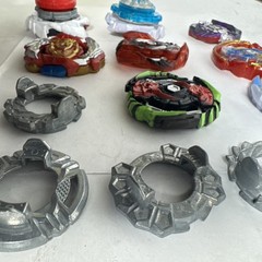 Bay Blades Lot Of 8 Bayblades Plus Parts and launchers