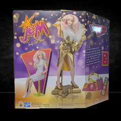 Jem and the Holograms Glitter and Gold Jem Jerrica 12-Inch Fashion Doll The