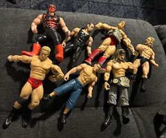 Wrestling action figures! Sold as a set, seven total. Over 15 years old.