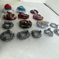 Bay Blades Lot Of 8 Bayblades Plus Parts and launchers