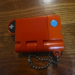Pokémon Mini Pokédex Toy Keychain – Pikachu Graphic – Orange Collector Gadget
